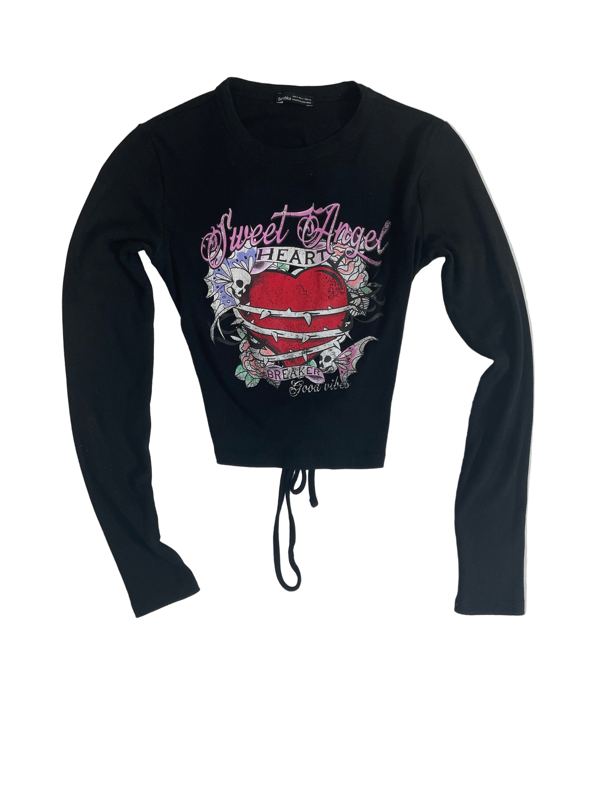 Black long-sleeve crop top with graphic design on a white background