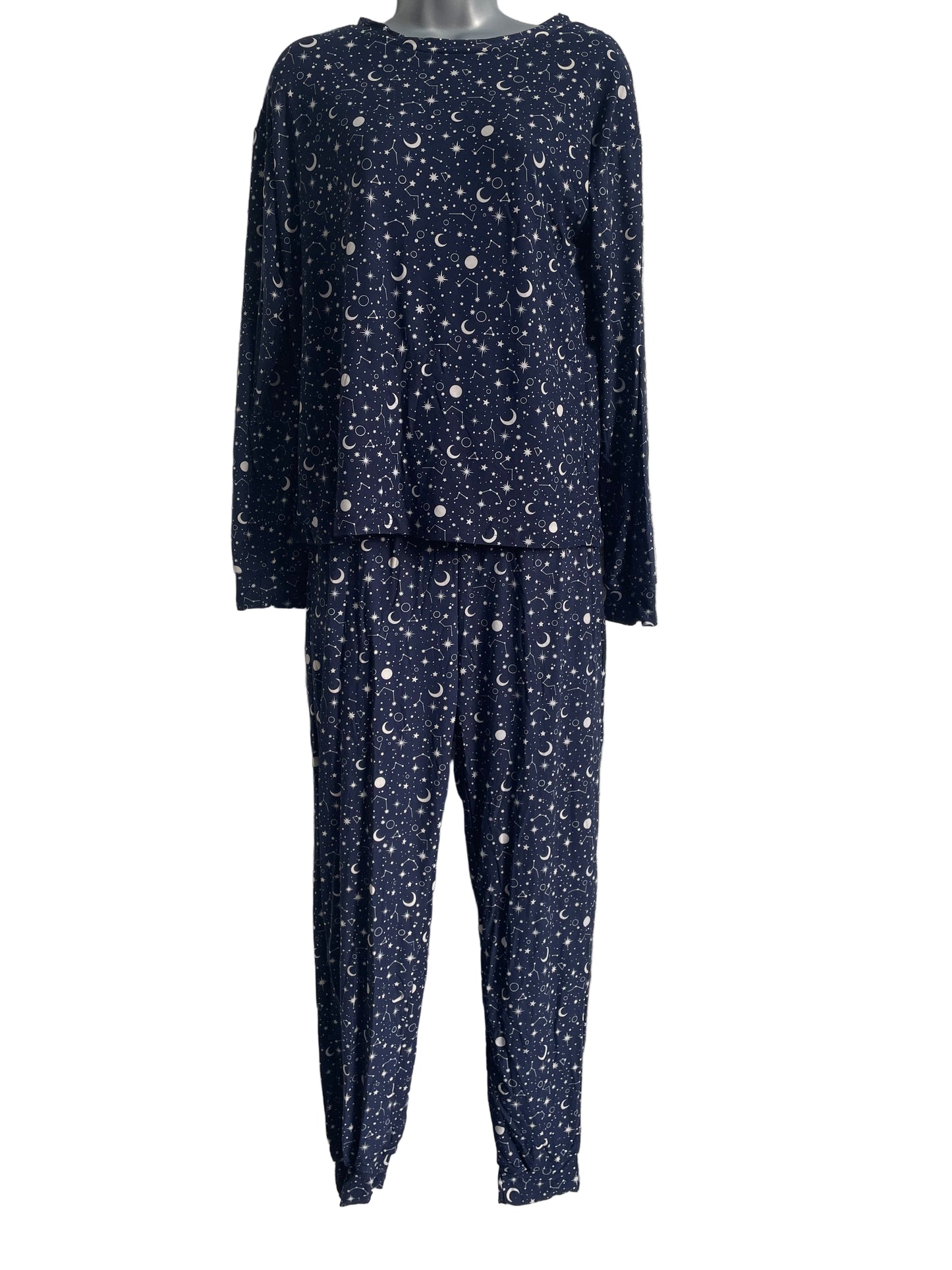 Navy blue fabric with white celestrial  stars and half moons.